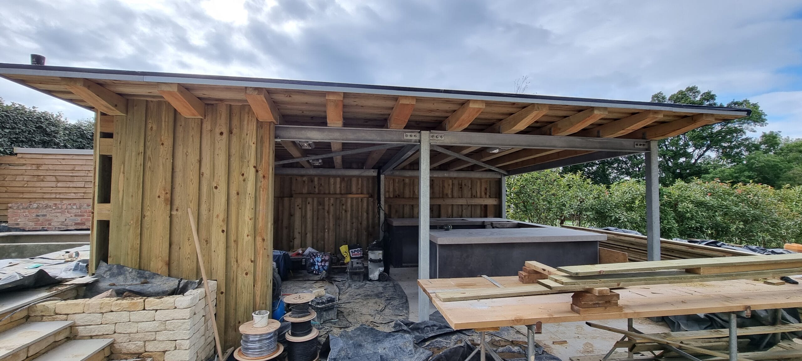 Landscape gardening build in Cheltenham, showing the early stages. If you are asking how to choose a landscape gardener, see if they can do their own build or do they subcontract it out.