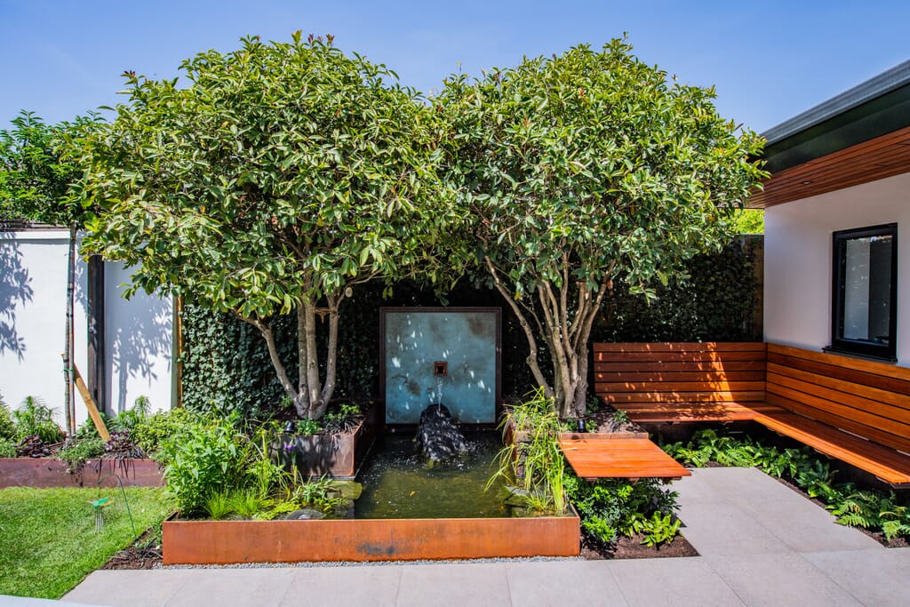 Luxury garden design Cotswolds, an award-winning garden design with bespoke water feature